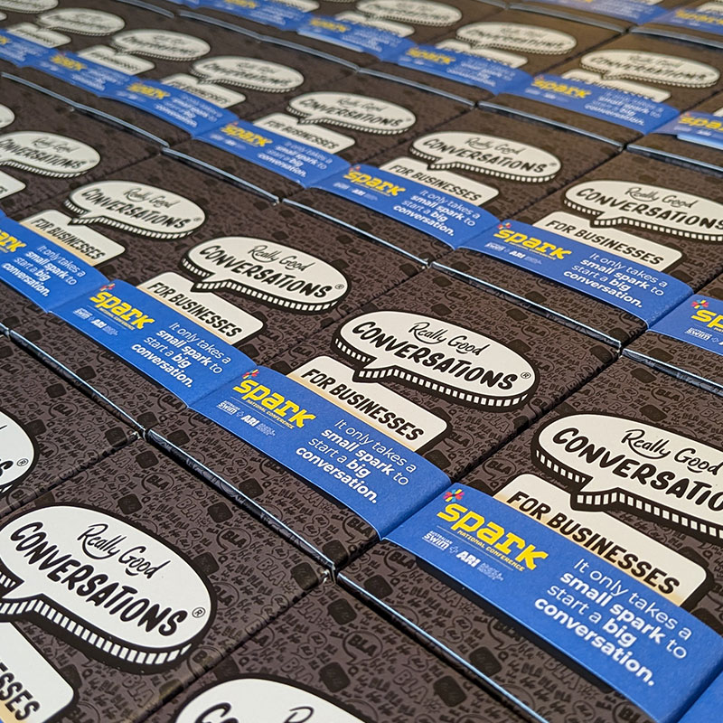 Spark Conference co-branded packs laid out