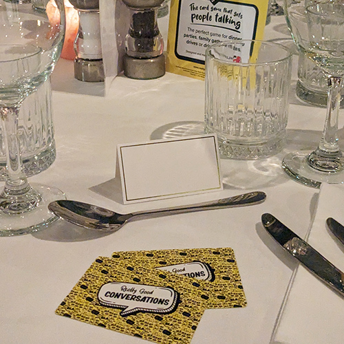 RGC cards placed at a table setting